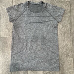 Size 12 good condition Lululemon shirt